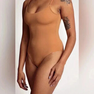 NWT Nubian skin seamless lightweight spaghetti strap  caramel naked bodysuit XS